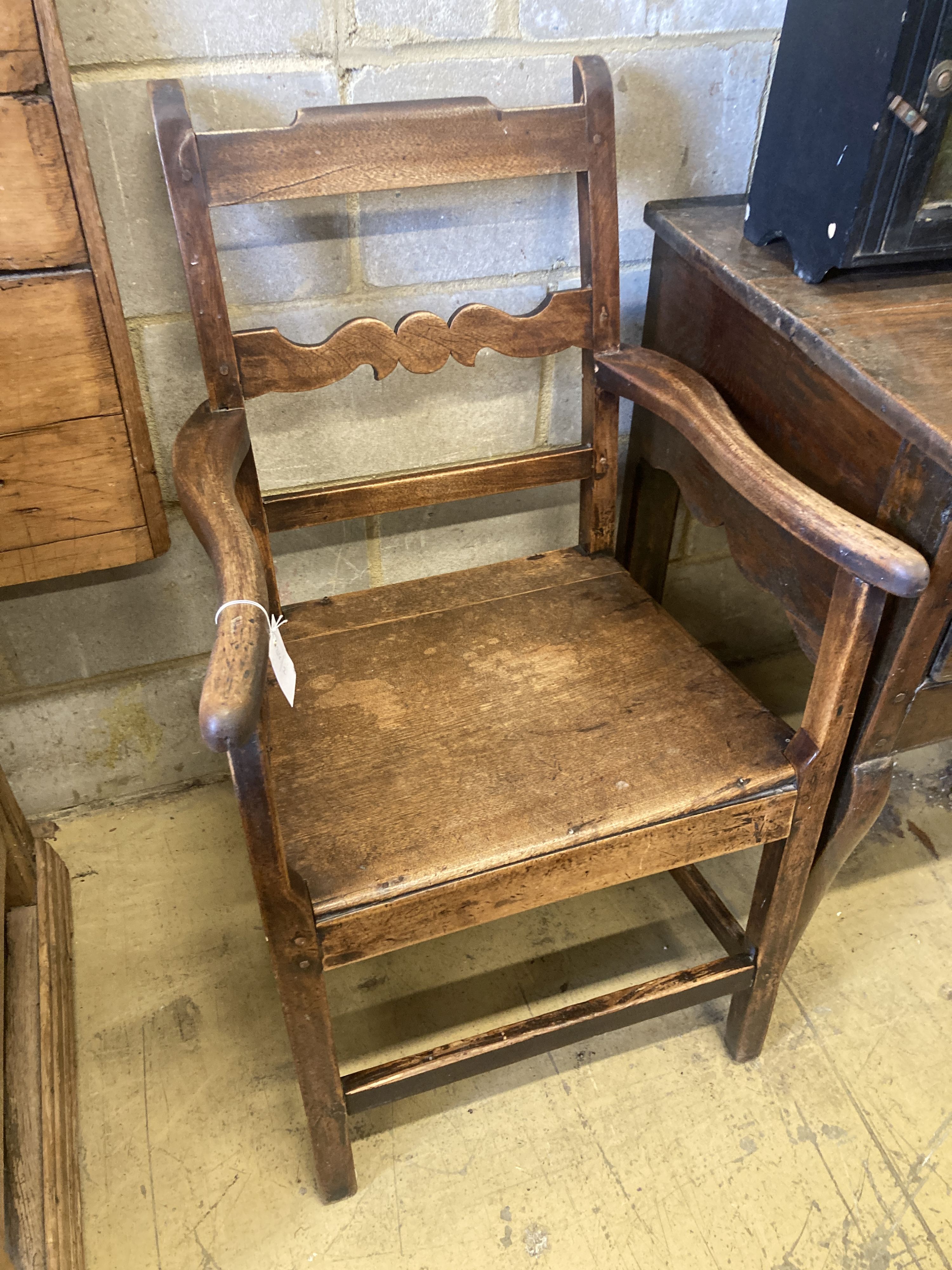 A late Victorian wall cabinet painted with a landscape scene, width 47cm, pair of provincial wood seat chairs, a mahogany three tier wall shelf and a Victorian overmantel mirror